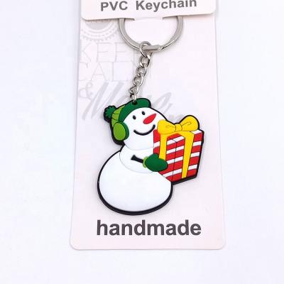 China Custom Soft Christmas Gifts Christmas Snowman PVC Rubber Key Chains Key Chains Kids Christmas Gifts Key Chains Individual Packaging for sale