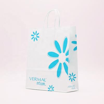 China Professional Customized Luxury White Biodegradable Kraft Paper Making Paper Packaging Bags With Floral Patterns for sale