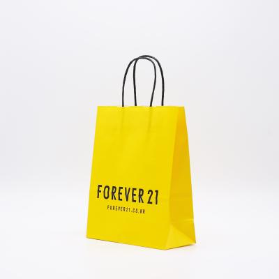 China HDPK 2022 Biodegradable Yellow Small Boutique Packaging Paper Bag With Handle Can Be Customized With LOGO for sale