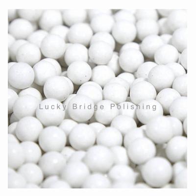 China Provide excellent performance white color ball form good porcelain media for polishing of vibratory finishing for sale