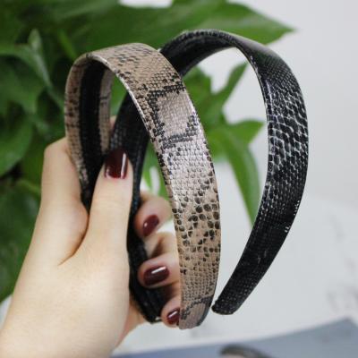 China Girls Hair Decoration High Quality Woman PU Headband Leopard Pattern Fashion Leather Thick Headbands for sale