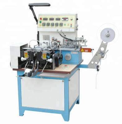 China Multifunction Woven Label Cutting and Folding Machine for Satin Ribbon, Cotton, Garment Care Labels JZ-2817 for sale