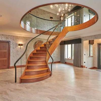 China ASTM Indoor Hand Forged Metal Spiral Stairs Villa Luxury Modern Curved Staircase for sale