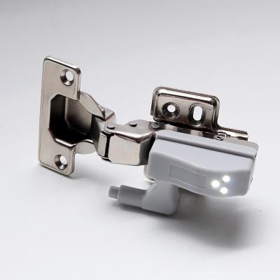 China A& J Furniture Hydraulic Dimming Hinge LED Lamp Lighting Pipe Cabinet Door Hinge for sale