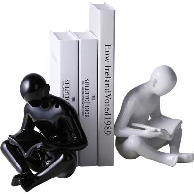 China Nordic Creative Europe Character Bookends Book Leaning TV Entrance Cabinet Decoration Model Room Desk Decorations Simple Porcelain Body for sale