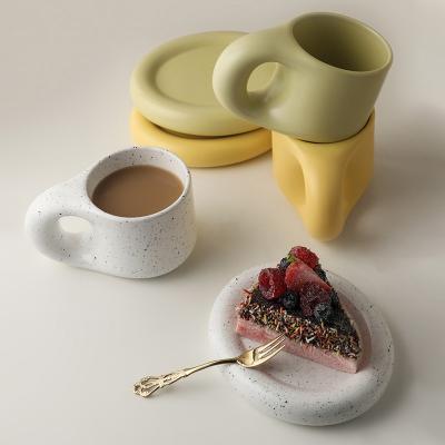 China Creative Handmade Coffee Tea Coffee Handle Cup and Saucer Wholesale Ceramic Oval Dish Cup for Coffee Tea Milk Cake Decor Nordic Home Kitchen for sale