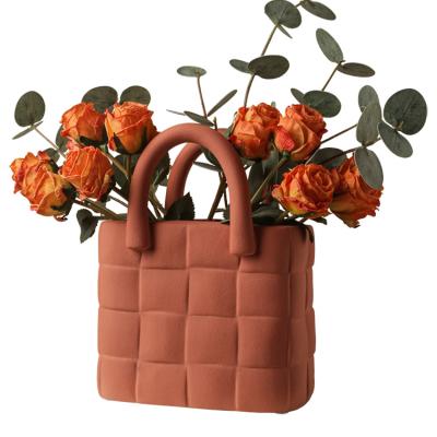 China New Arrival Ceramic Craft Semi-manual Nordic Style Woven Bag Minimalist Hot Selling Flower for sale