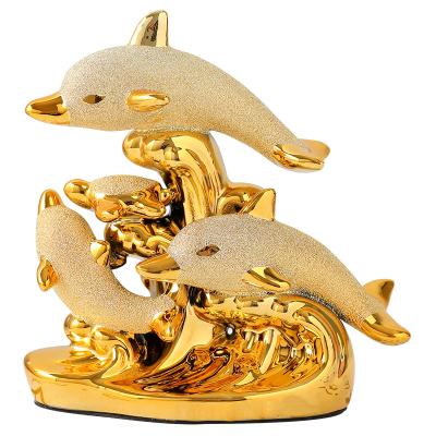 China Artificial European Golden Dolphin Figurines Animal Statue For Wedding Home Decoration Gift for sale