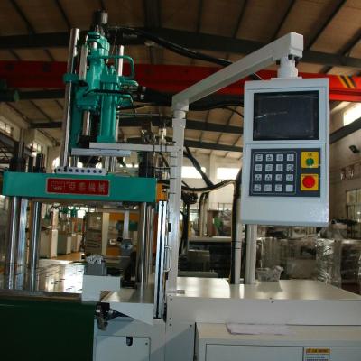 Cina LSR vertical injection moulding machine-double sliding table in vendita