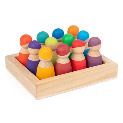 China Mini Toy Montessori Material 12 Pcs Puppet Educational Toy Rainbow Painted Colorful Peg Doll for sale