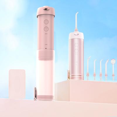 China Car OEM Electric USB Wireless Professional Waterproof Dental Portable Pink Ipx7 Oral Teeth Care Water Flosser With 200ml Water Tank for sale