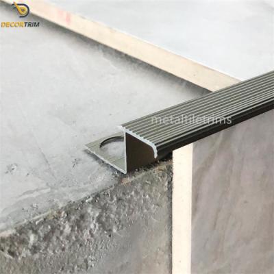 China Aluminum Alloy 6063 Stair Nose Tile Edging Trim Anodized Matt Bronze Non Slip for sale