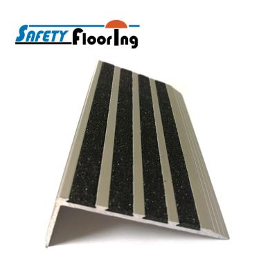 China Aluminum Insert Black Metal Carborundum Aluminum Stair Nosing For Laminate Flooring for sale