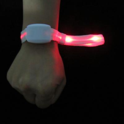 China Strap Radio Control Concert Dmx LED Light Glow Up Wristband Bracelets for sale