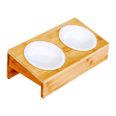 China Sustainable Customized Cat Food Bowl Bamboo Elevated Pet Bowls With 2 Removable Ceramic Bowls for sale