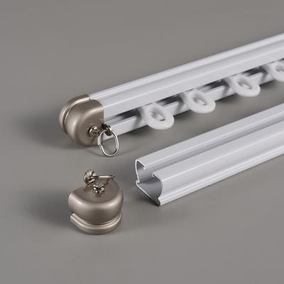 China Eco-Friendly Home Stretch Ceiling Mounted Curtain Rod Holder Bedroom Metal Curtain Pole Track Rails for sale