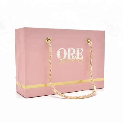 China Recyclable Customized Rose With Logo UV Paper Hand Jewelry Shopping Bag for sale