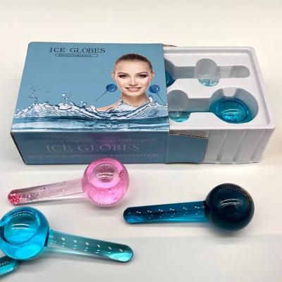 China New Design Cool Hot Sale 2pc Beauty Ice Cooling Roller Ball Glitter Pink Ice Globes For Face Anti Aging for sale