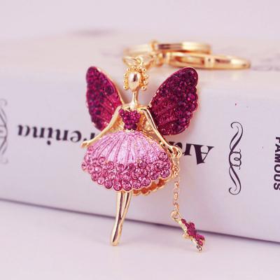 China Metal Fashion Angle Girl Rhinestone Wing Key Chain For Women Handbag Decoration for sale