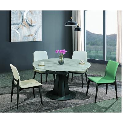 China Classy Luxury Single Modern Home Furniture Rotation Kitchen Dining Table Carbon Steel Material Table for sale