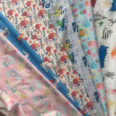 China PU Waterproof Coating Polyester Baby Raincoat Breathable Raincoat Fabric for sale