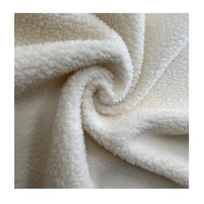 China Factory Supply Breathable Lamp Artificial Wool Fabric For Clothes Textile Home Blanket for sale