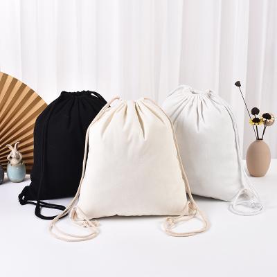 China Eco-Friendly White Pocket Travel Black Canvas Organic Cotton Drawstring Backpack Eco-Friendly Storage Packing Custom Logo Dust Bags for sale