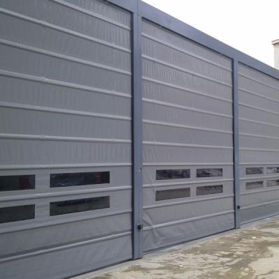 China Heat Insulation High Speed ​​Cloth Cloth And PVC Exterior Electric Vertical Folding Door Shutters For Sale for sale