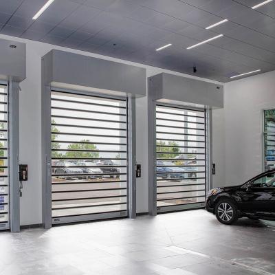 China Thermal Insulation Polycarbonate Slats Full View Transparent High Speed ​​Fast Action Roll Up Shutter Garage Doors for sale