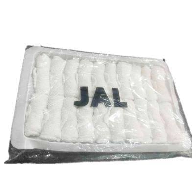 China Compressed cotton airline oshibori towel with trays and clips for sale