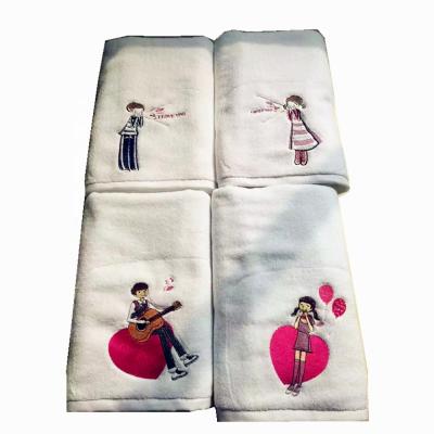 China 100% Compressed Cotton Embroidery Towel Design Fancy Hotel White Face Hand Towels for sale