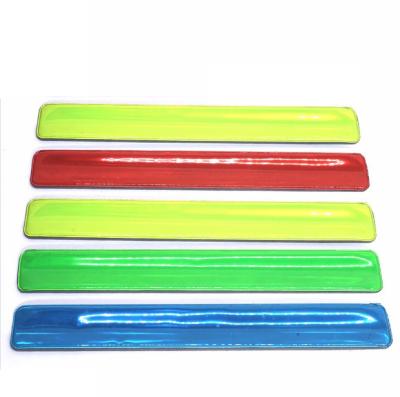 China Easy To Clean Reflective PVC Slap Wristband Sports Safety Slap Wristband for sale