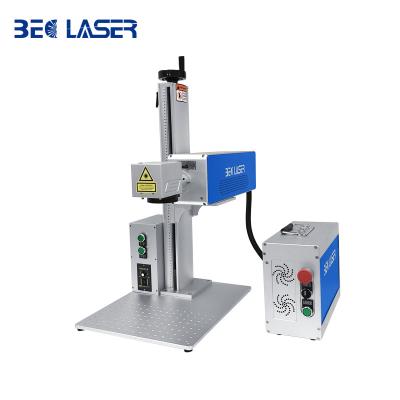 China High Quality Portable Air-cooled CO2 Laser Marking Machine For Plastic Wood 3D No-metal Cutting And Engraving Machine for sale