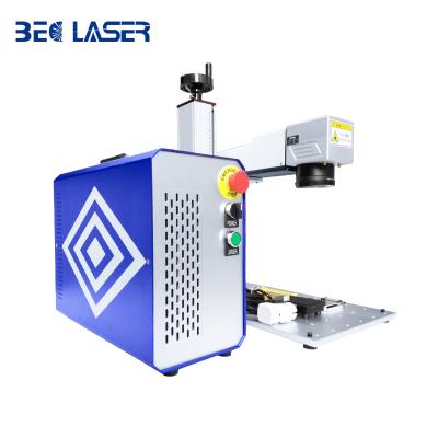 China 2022 air-cooled portable type 20w 30w 50w stainless steel fiber laser marking machine for 3D automobile instrument steering wheel for sale