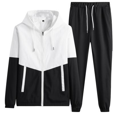 China Sustainable tracksuit set to sew custom logo men's 2 piece set with zipper stacked jogger pants with side pockets tracksuits for men for sale