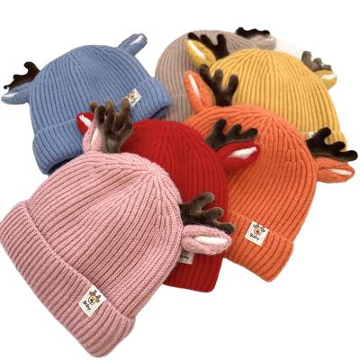 China Warm Warm Windshield Knit Christmas Hats For Kids Christmas Reindeer Hat For Winter Baby Kids Winter Funny Hat for sale