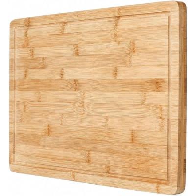 China Sustainable Bamboo Cutting Board Juice Groove Professiona Wooden Chopping Board Meat Cutting Board Cheese Block for sale