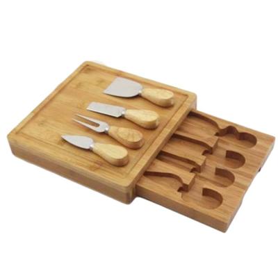 China Eco-friendly Wholesale Board Bamboo Cheese Cutting Board Set With Stainless Steel 4 Knife for sale