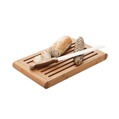 China Sustainable Bamboo Board Crumb Saving Cutting Board Bread Slicer With Crumb Catcher Tray for sale