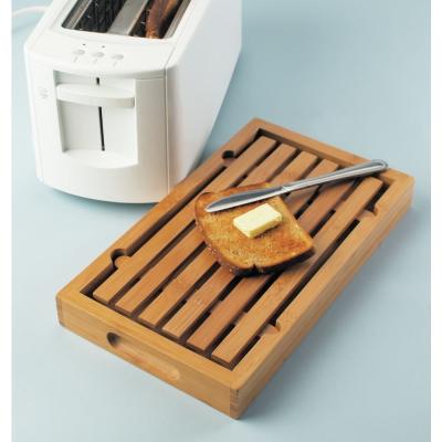 China Wholesale Cheap High Quality Sustainable Natural Bamboo Wooden Crumb Catcher Price Slatted Top Bread Cutting Board for sale