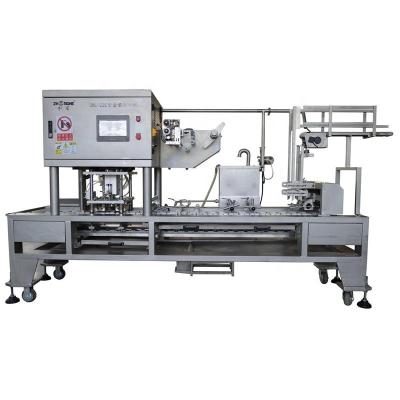 China automatic food box sealing machine for sale