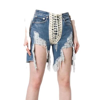 China SUSTAINABLE TWOTWINSTYLE Ripped Hole Denim High Waist Lace Up Asymmetrical Fringed Straight Shorts for sale