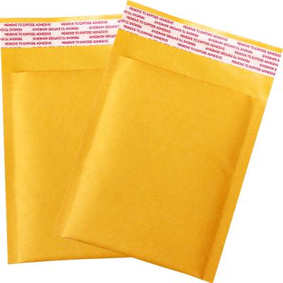 China Wholesale Courier Self Adhesive Bags Yellow Kraft Paper Bubble Envelope Mailer Bags With Logo for sale