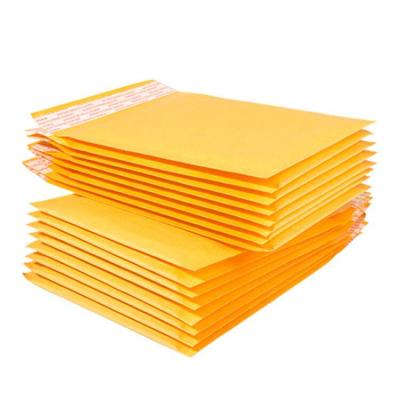 China Wholesale High Quality Adhesive Seal Kraft Paper Bubble Envelope Yellow Leopard Bag Sending Bags Express Bags for sale