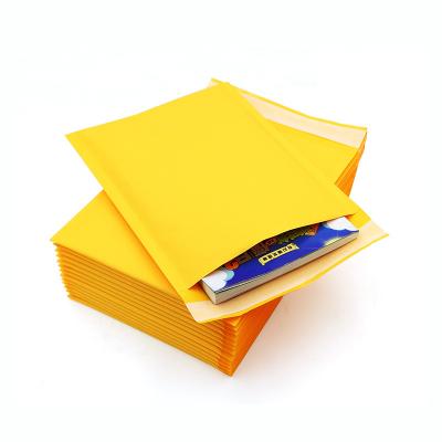 China Wholesale High Quality Yellow Adhesive Seal Kraft Paper Bubble Envelope Mailing Bags Express Bags for sale