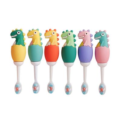 China Cute Look Dinosaur Cartoon Kids Toothbrush for sale