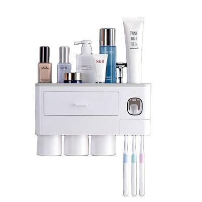 China Hot Selling Eco Toothpaste Dispenser Wall Mount Plastic Viable Toothbrush Holder Automatic Multifunctional Bathroom Set for sale