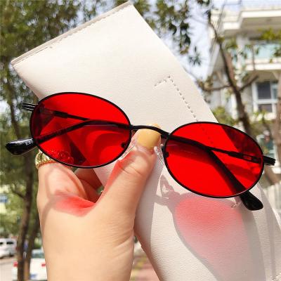 China 10 Years Experience Newest Fashionable Lady Luxury Rimless Designer Sunglasses Vintage Lens Retro Metal Red Oval Glasses For Women for sale