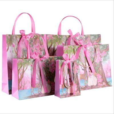 China Cheap Retail Materials Low Cost OEM Recycled Luxury Brand Printing Luxury Gift Shopping Paper Bag for sale