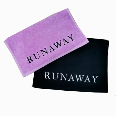 China Compressed Custom Purple Hand Towel With Embroidery Logo Promotional Cotton Towel for sale